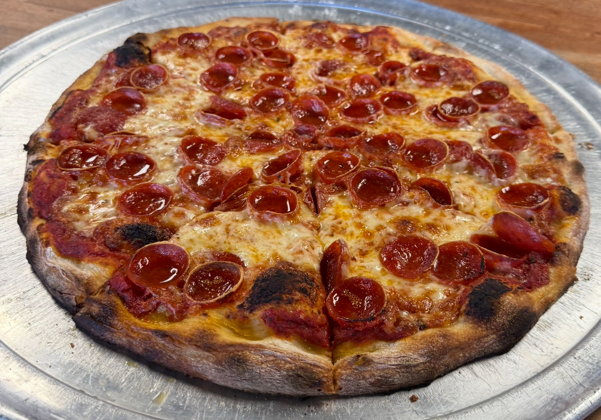 Rocks 24 Pizzeria signature dishes Italian Beef Sandwich
Tavern Style Pizza
Pepperoni Special Pizza